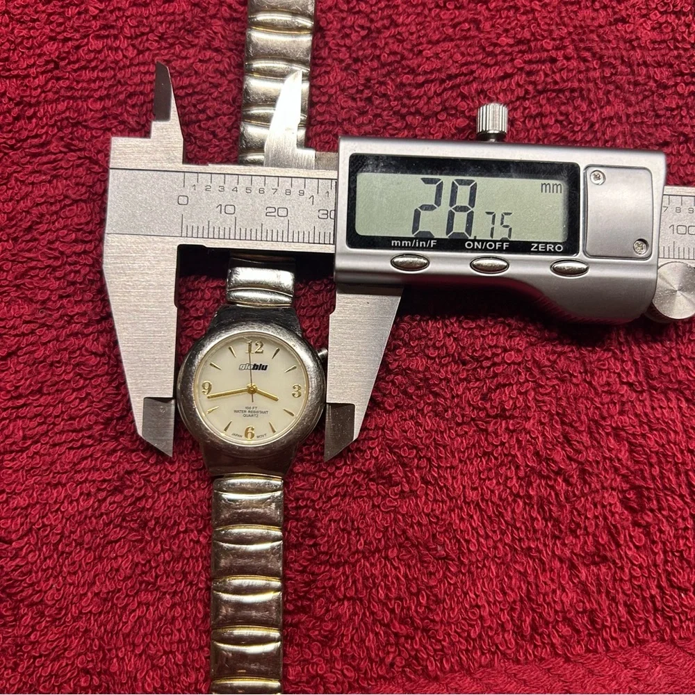 VTG GoBlu Illuminating Wristwatch Round White Face Silver & Gold Tone Band